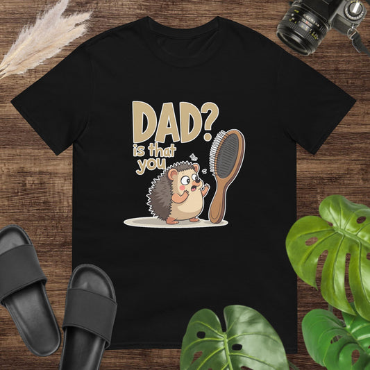 Unisex t-shirt featuring a cartoon hedgehog beside a hairbrush for funny dad gift buyers.