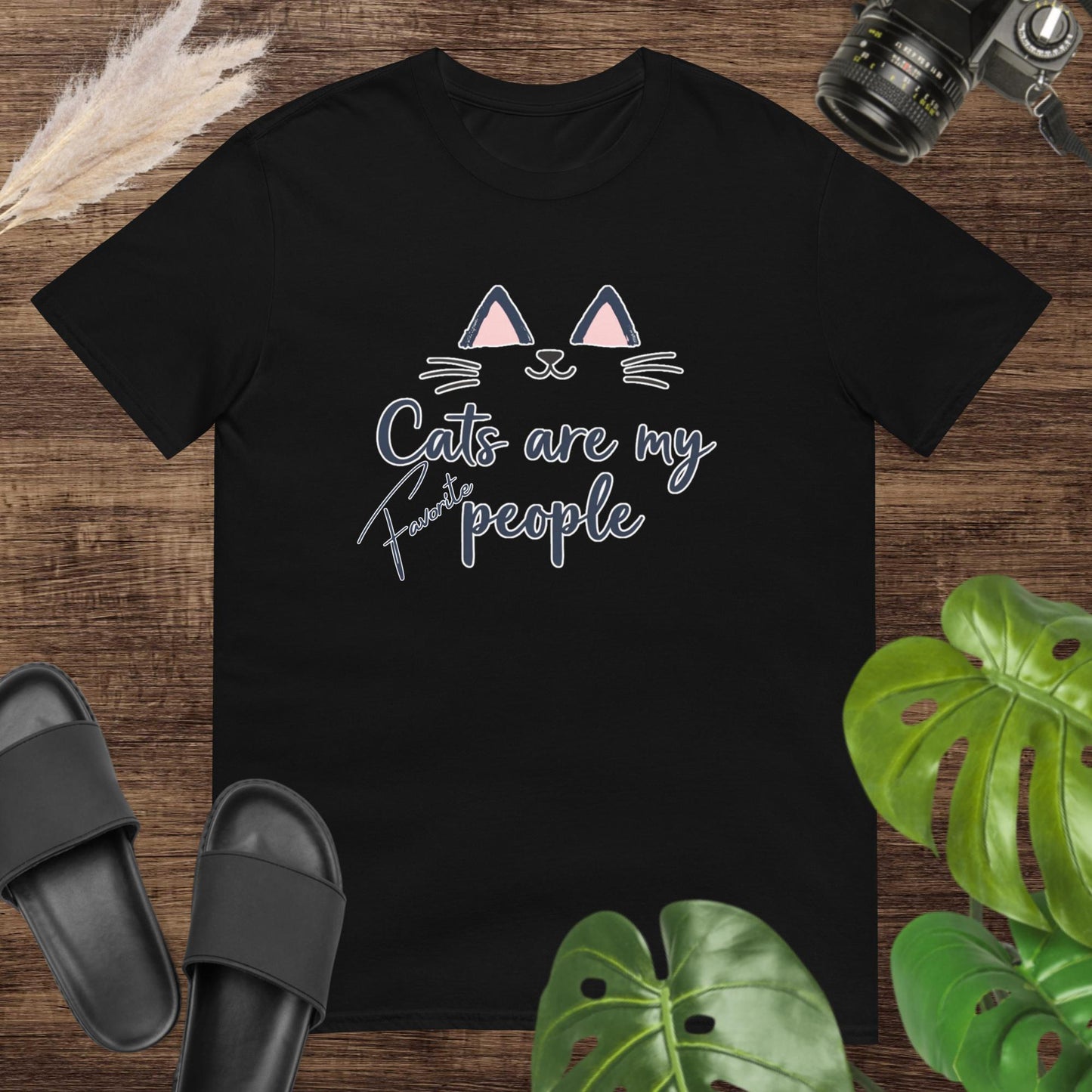Black t-shirt featuring minimal cat design with a soft handwritten style "Cat are my favorite people"
