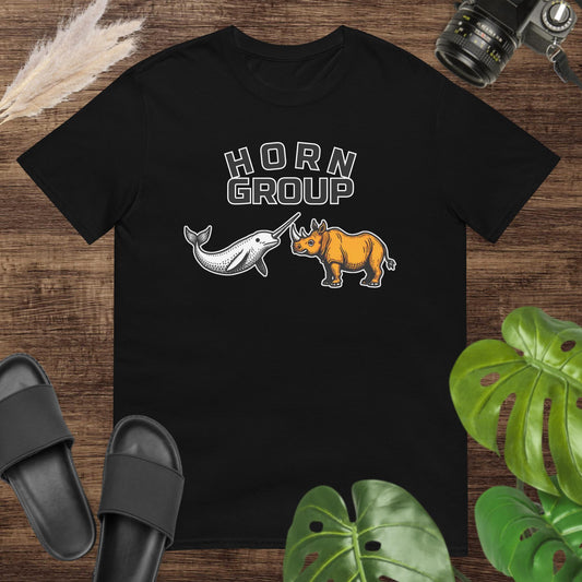 Unisex black t-shirt featuring a narwhal and a rhinoceros with the words “HORN Group.”