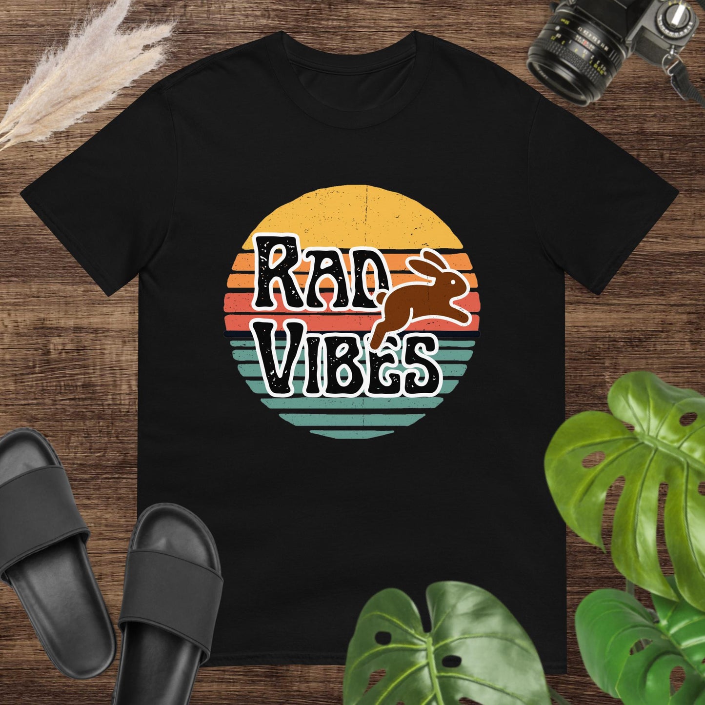 Black vintage sunset style t-shirt with a running rabbit ant the text Rad Vibes