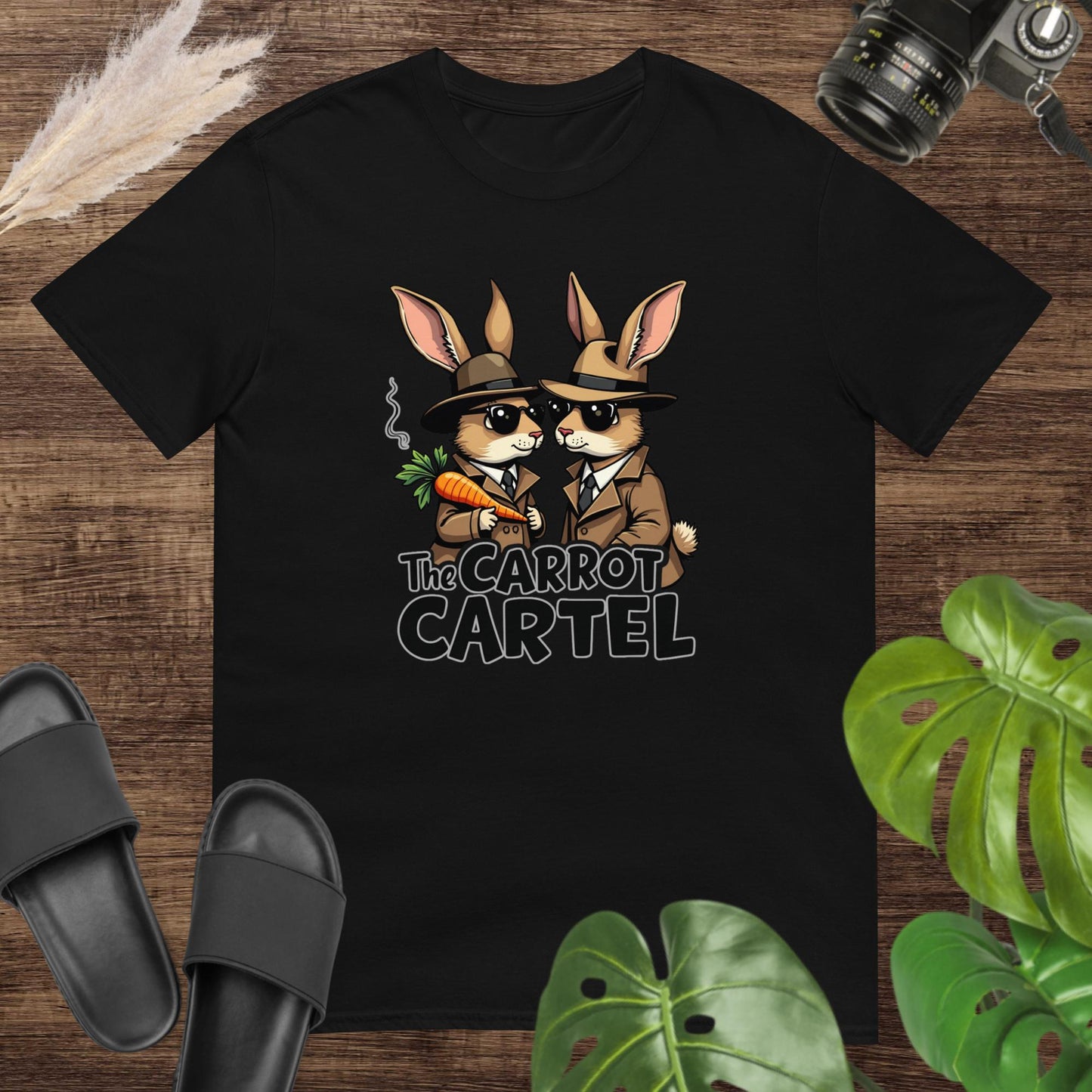 Black t-shirt featuring two funny rabbit detectives with a steamed carrot and text The carrot cartel