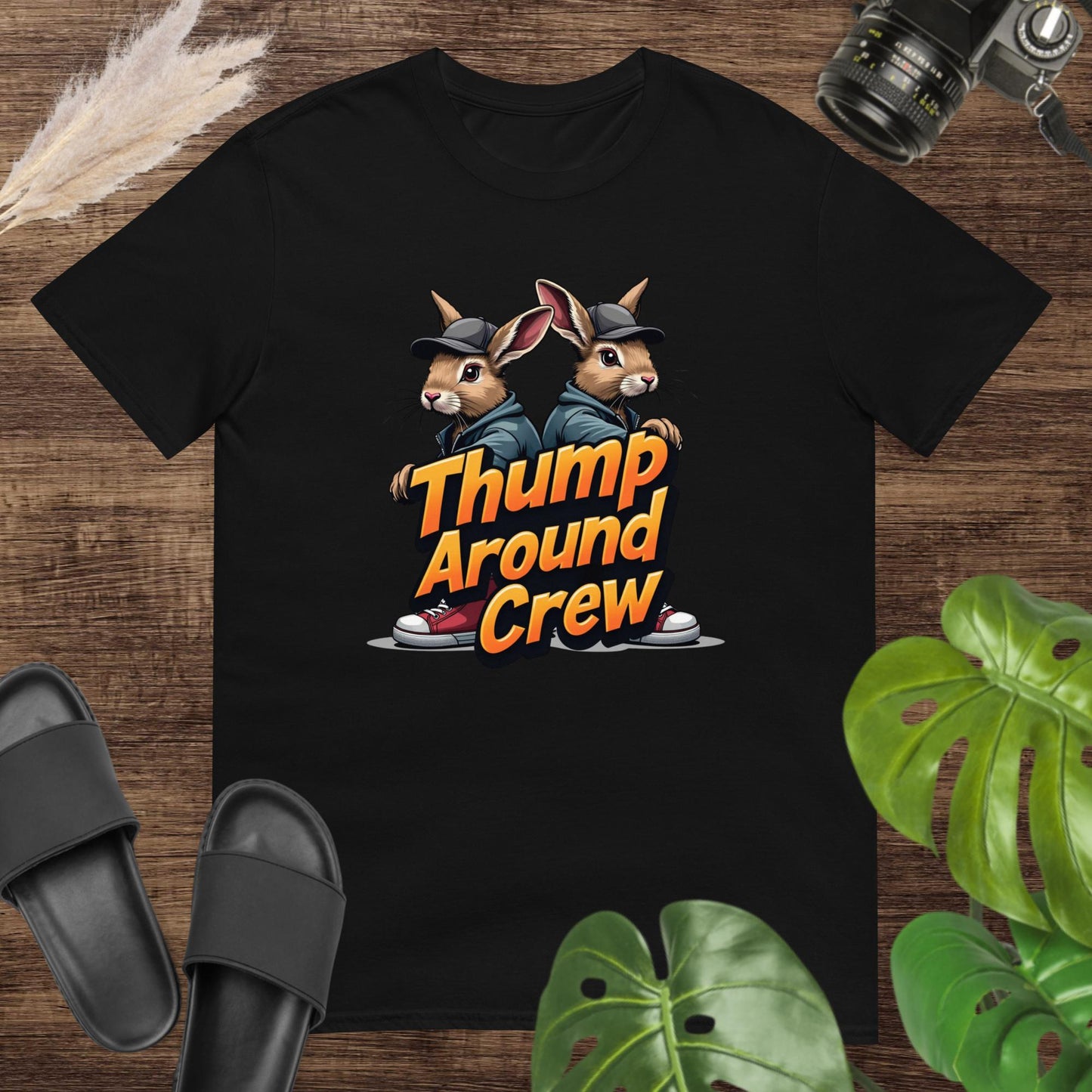 Streetware black t-shirt featuring two dressed bunnies and the text thump around crew