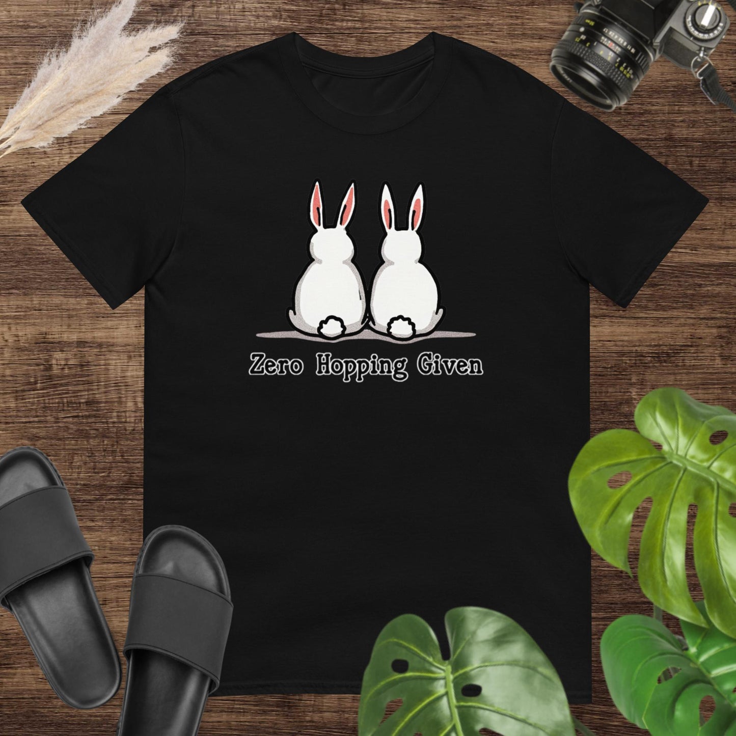 Cute and sassy zero hopping given black t-shirt design with a rabbit duo turning their back