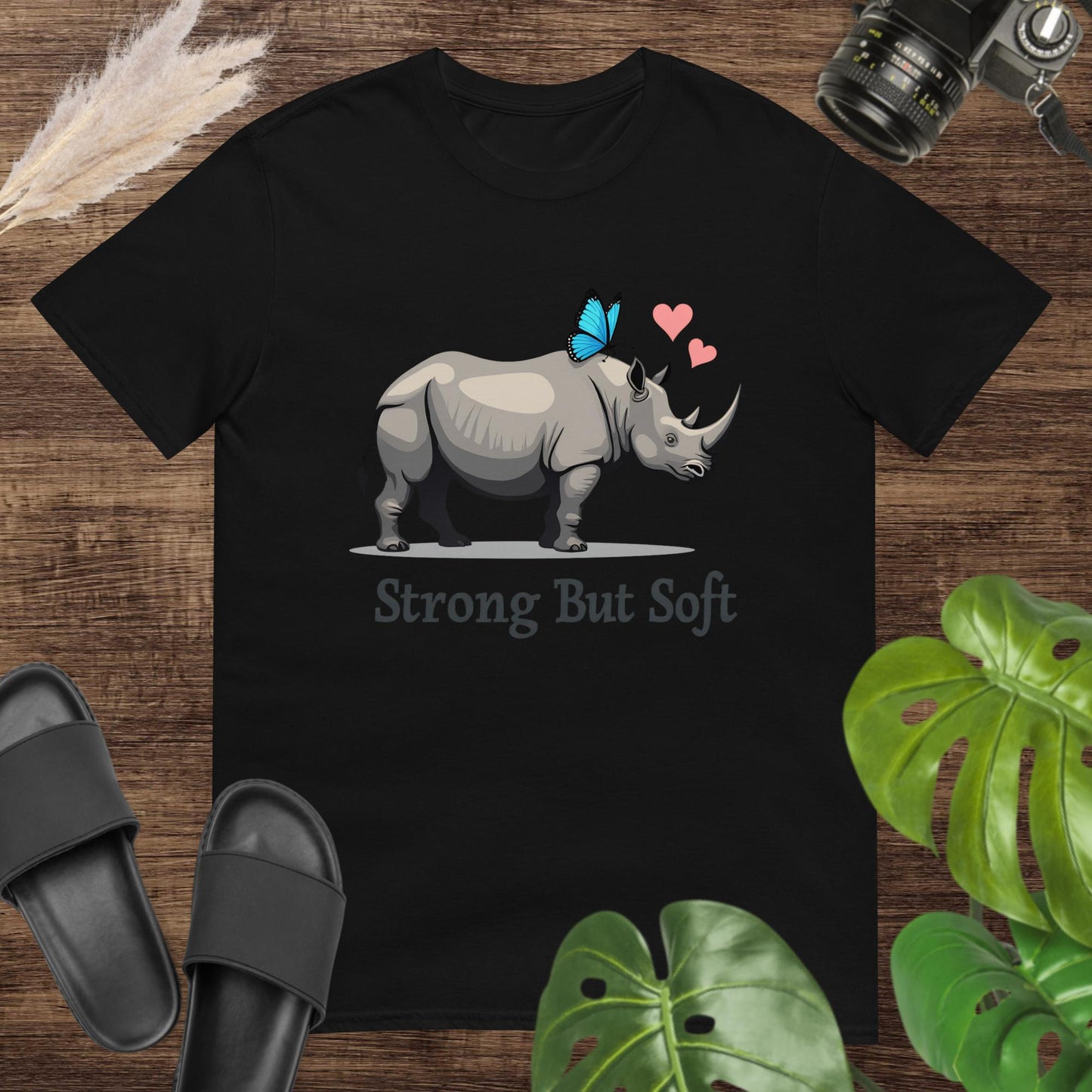 Cute strong but soft black t-shirt design with a butterfly on a hippo with hearts 