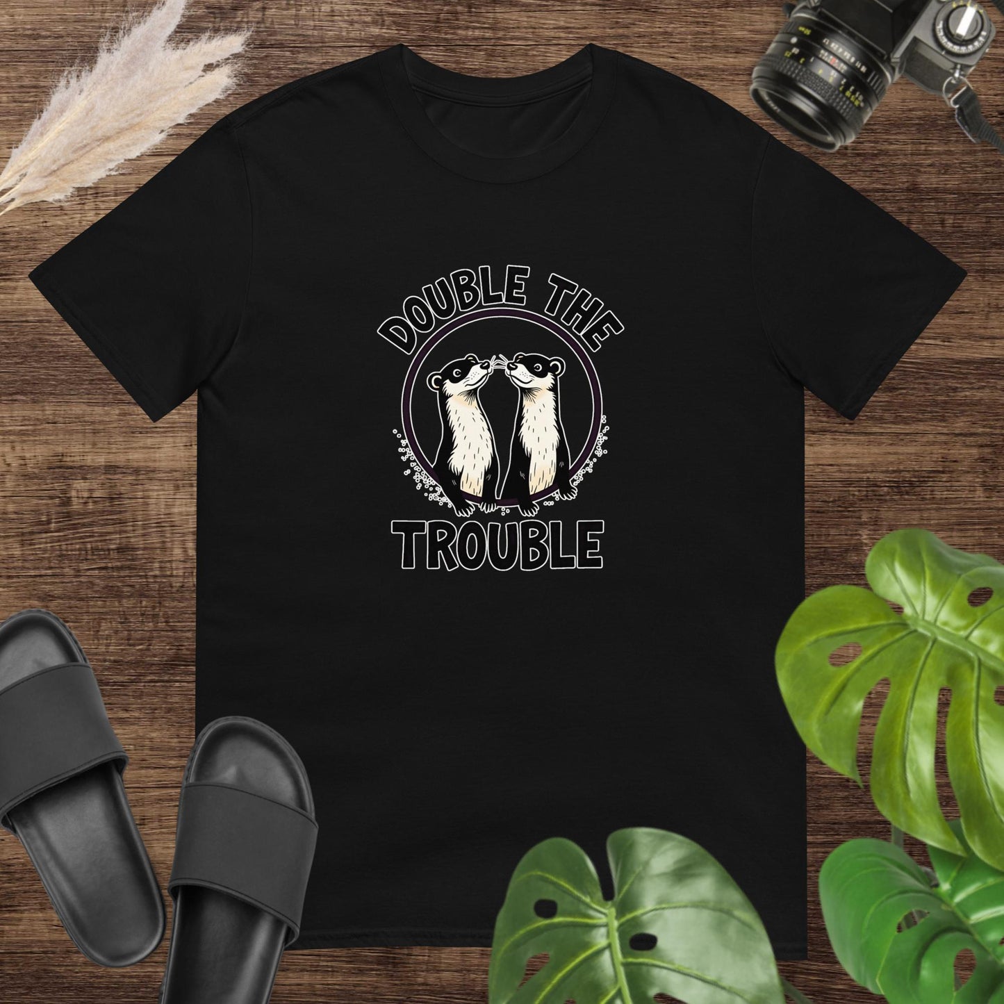 Unisex black t-shirt featuring two ferret inside a circle with the text Double the Trouble.