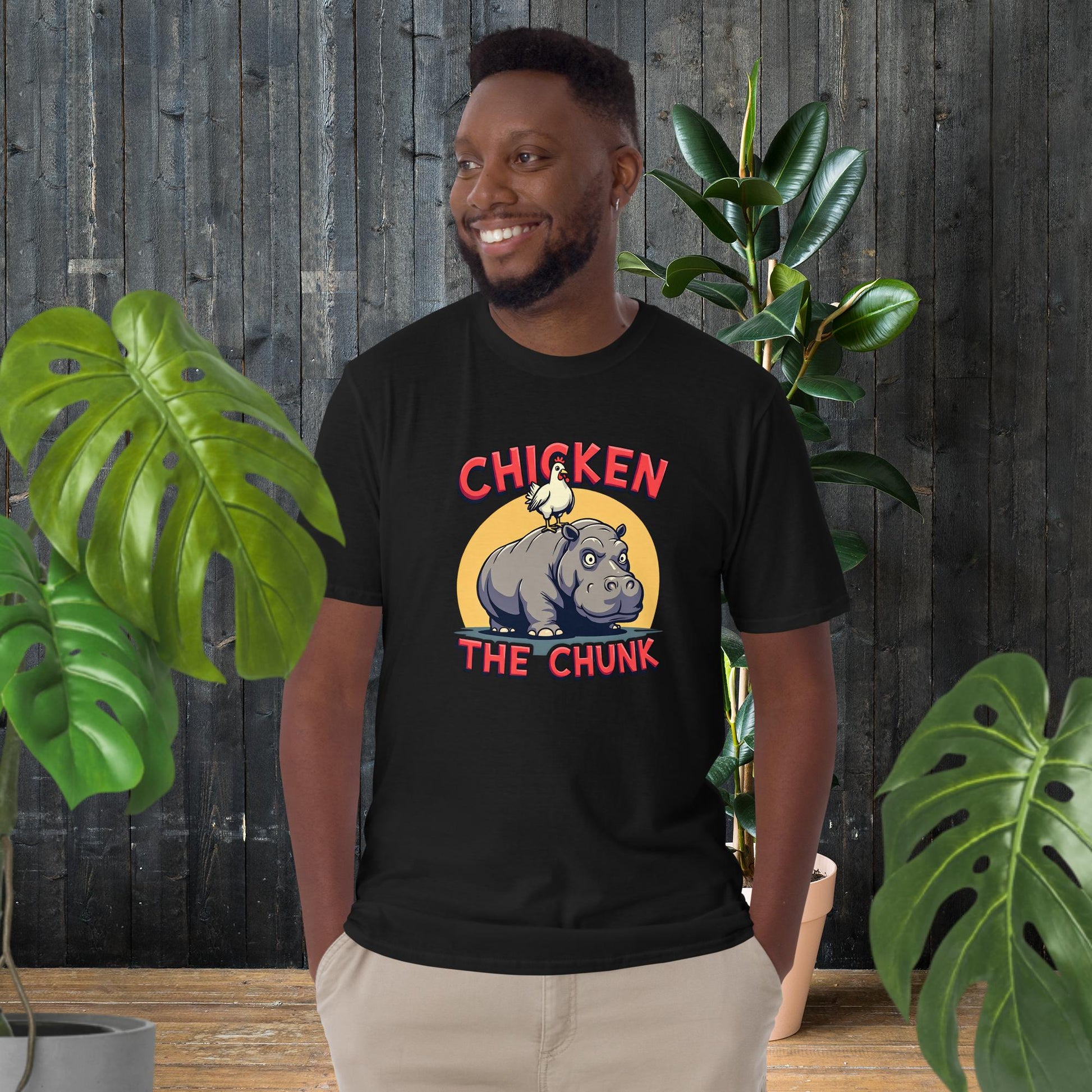 Man wearing funny chicken on hippo graphic tee, 100% ring-spun cotton, unisex animal duo shirt