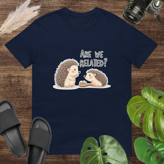Unisex t-shirt featuring two hedgehogs and funny family resemblance text for animal lovers.