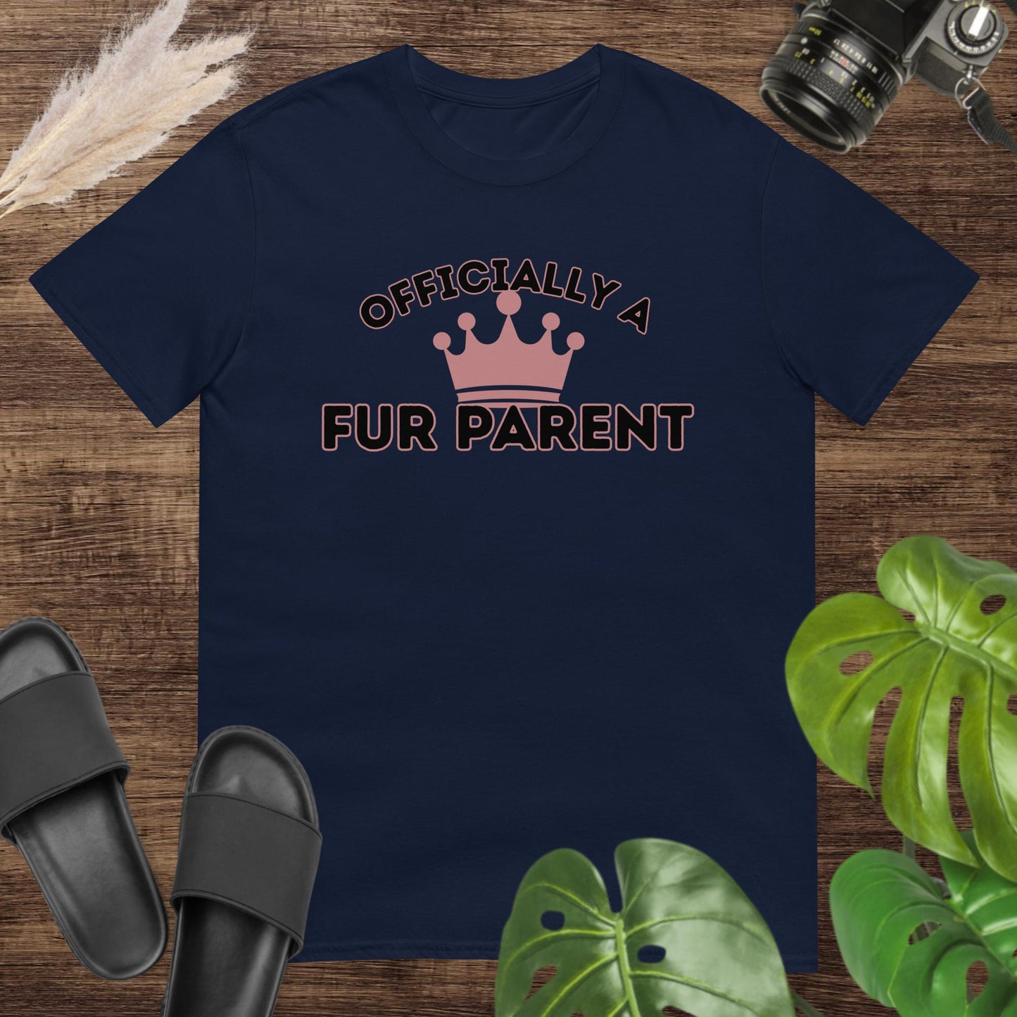 Navy t-shirt featuring a crown surrounded by the text Officially a Fur Parent