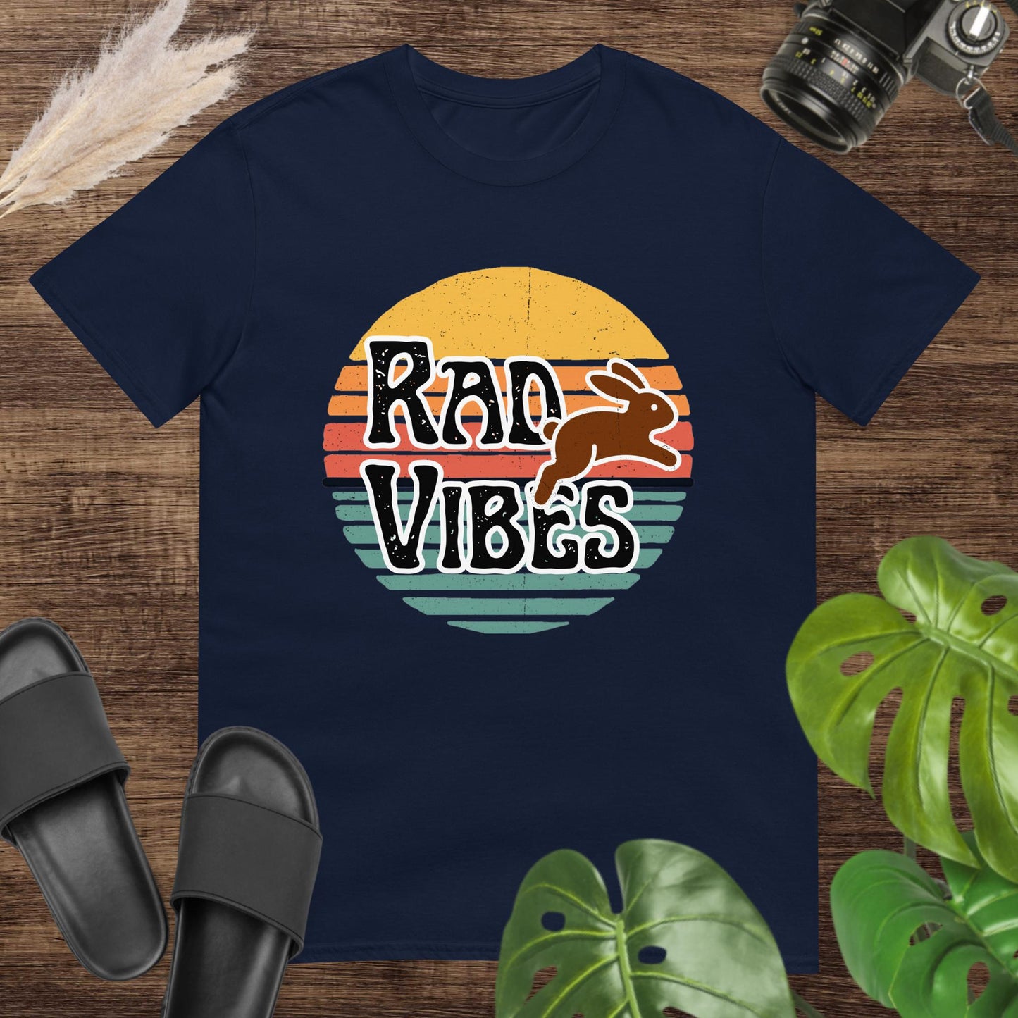 Navy vintage sunset style t-shirt with a running rabbit ant the text Rad Vibes