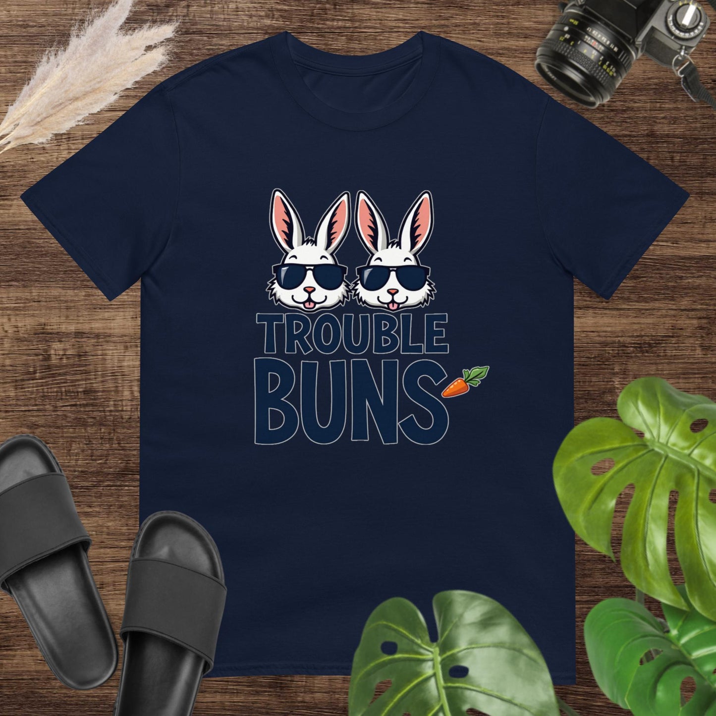 Funny navy t-shirt featuring two bunny heads with glasses and the text trouble buns
