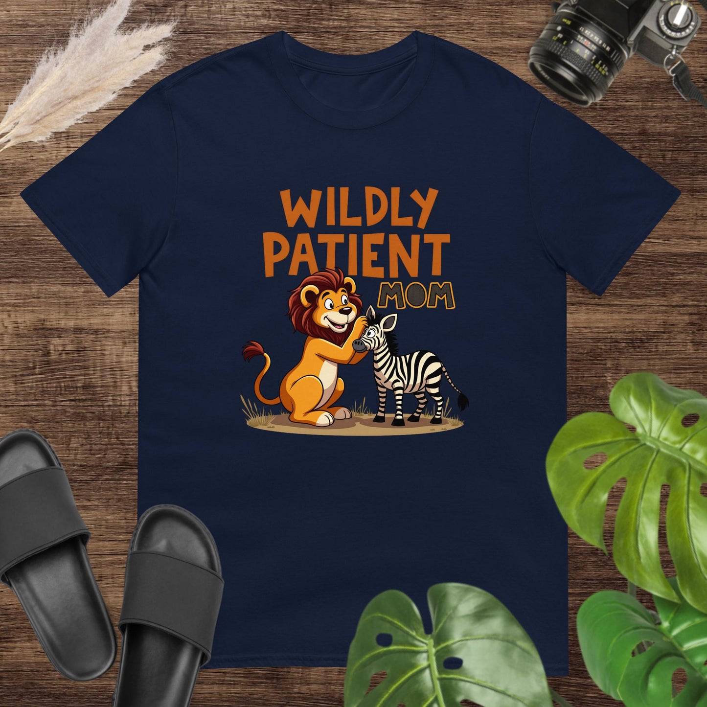 Cute unexpected duo "Wildly patient mom" navy t-shirt design with a lion and a zebra