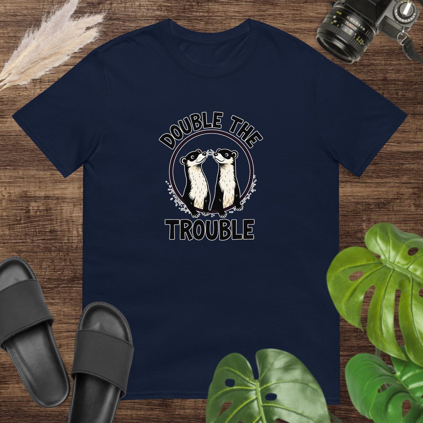 Unisex navy t-shirt featuring two ferret inside a circle with the text Double the Trouble.