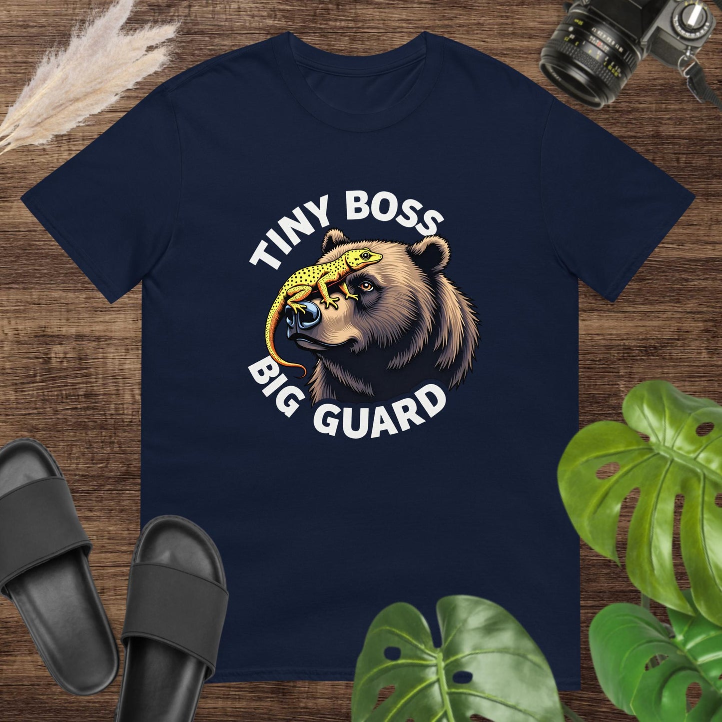 Unisex navy tee featuring a bear and gecko graphic with Tiny Boss, Big Guard text.