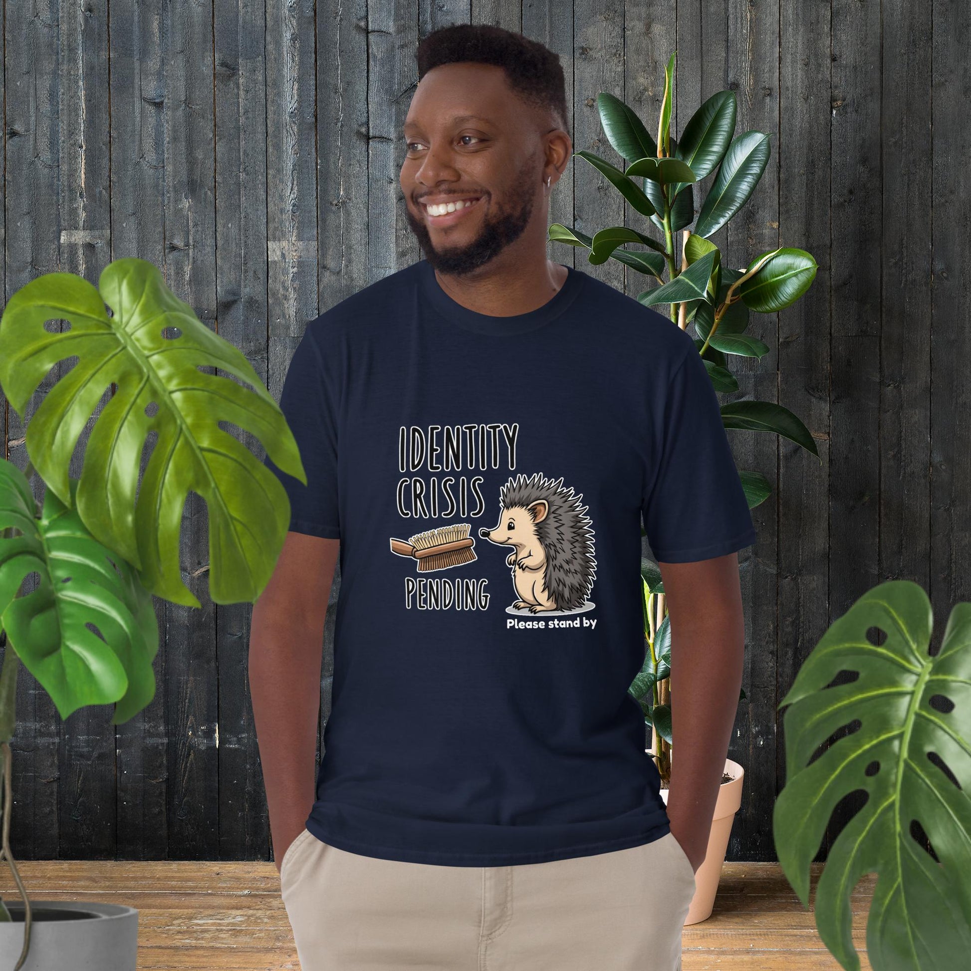 Man wearing funny hedgehog graphic tee with 'Identity Crisis Pending' text, cute animal design, unisex t-shirt
