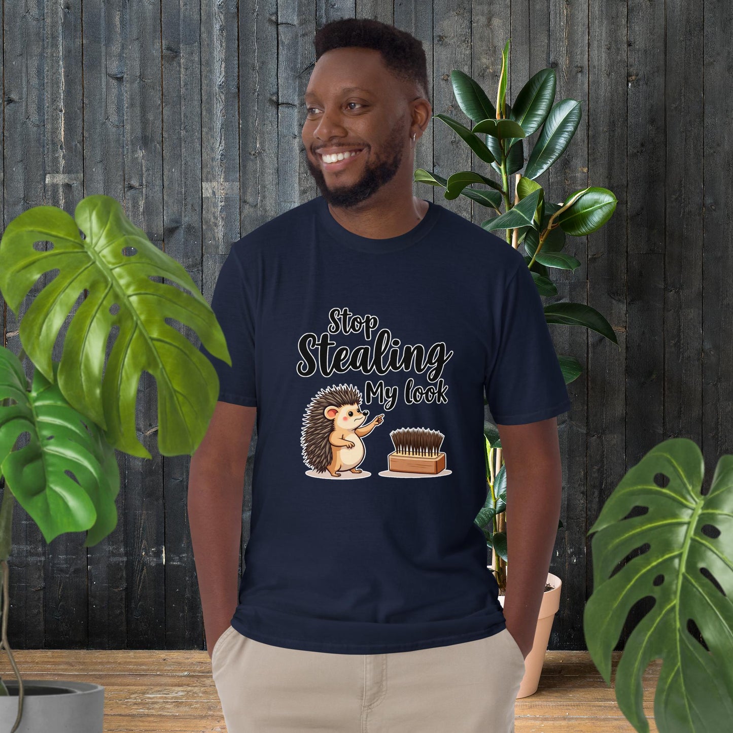 Man wearing funny hedgehog graphic tee with 'Stop Stealing My Look' text, cute animal design, unisex cotton t-shirt