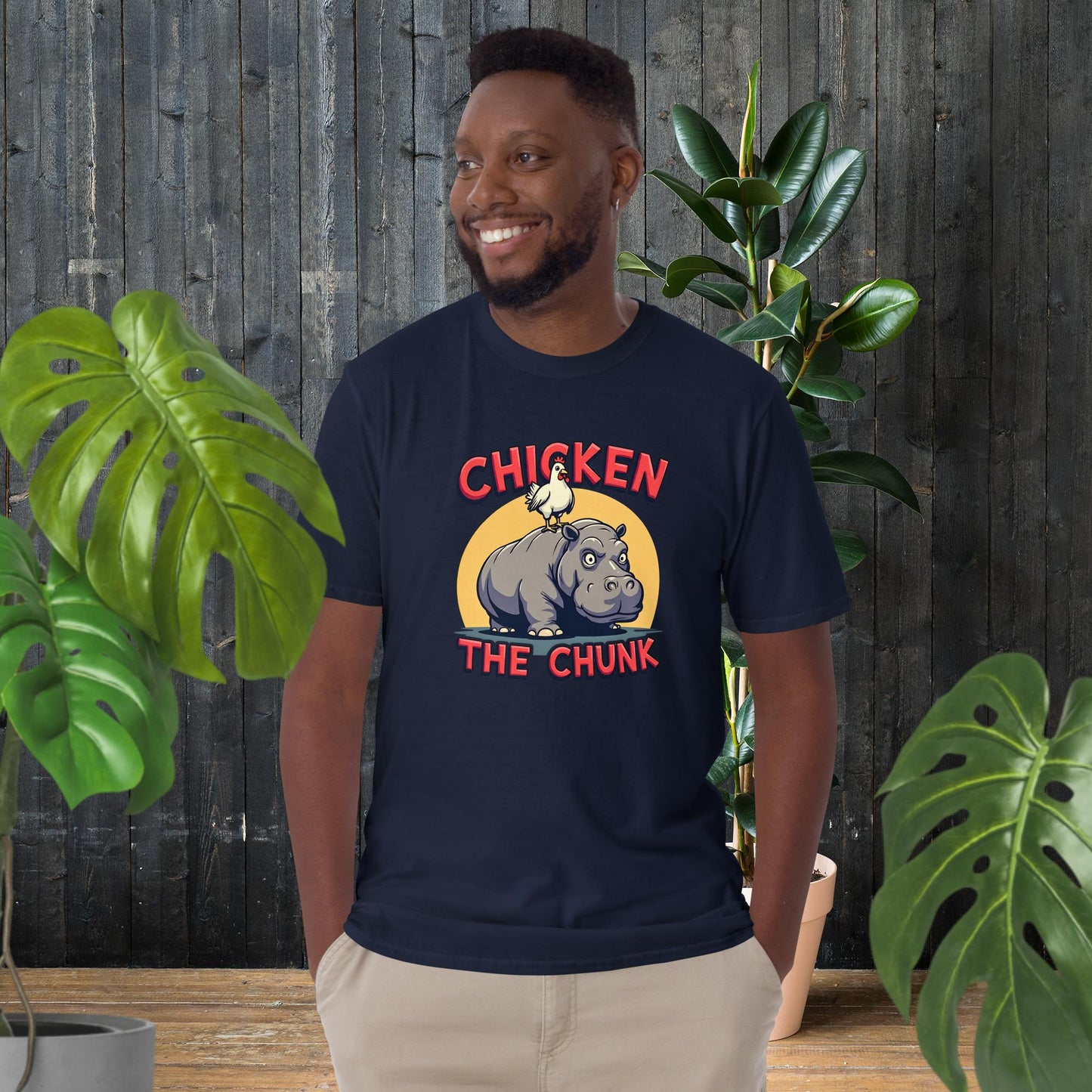 Man wearing funny chicken on hippo graphic tee, 100% ring-spun cotton unisex t-shirt