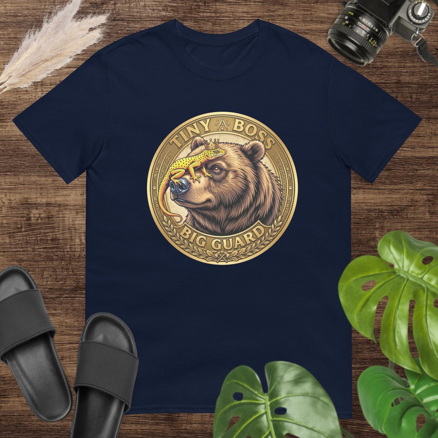 Navy unisex tee with 'Tiny Boss Big Guard' bear and gecko graphic, 100% ring-spun cotton