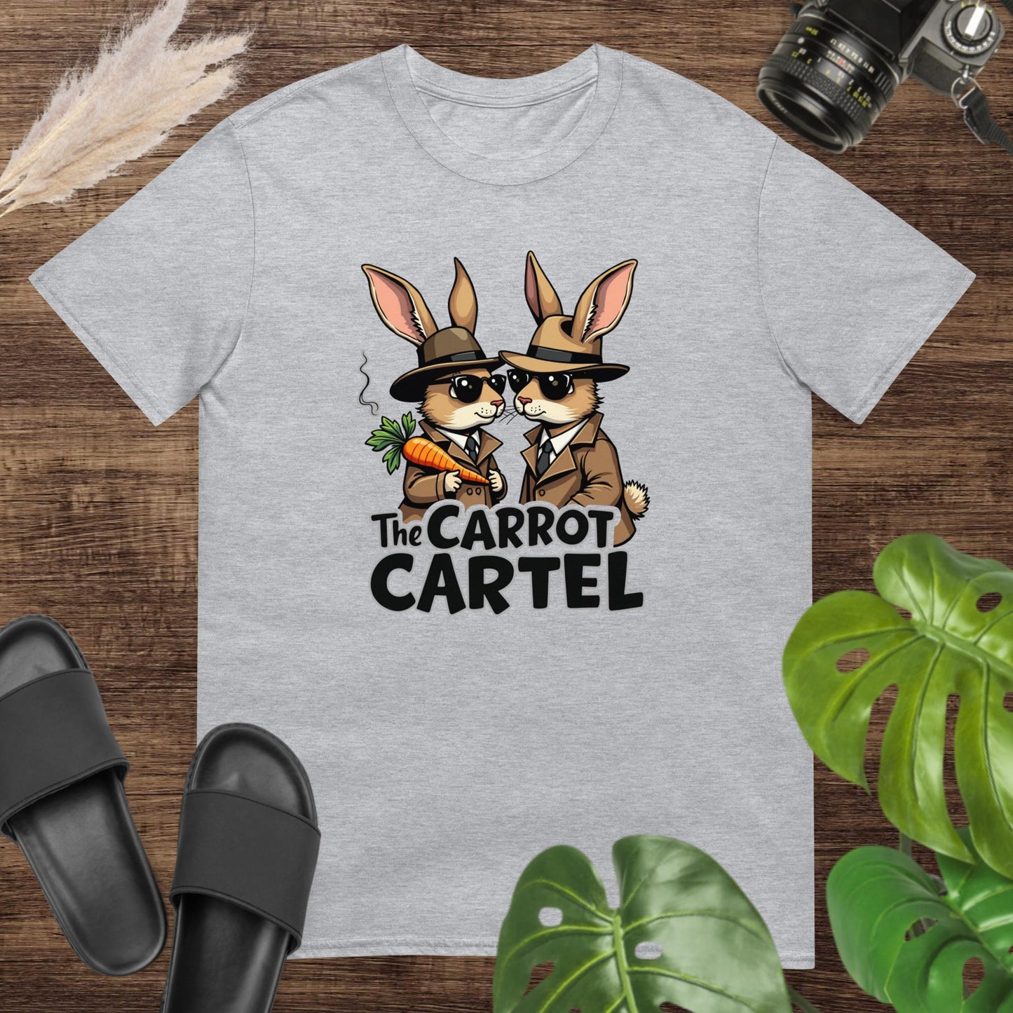 Grey t-shirt featuring two funny rabbit detectives with a steamed carrot and text The carrot cartel