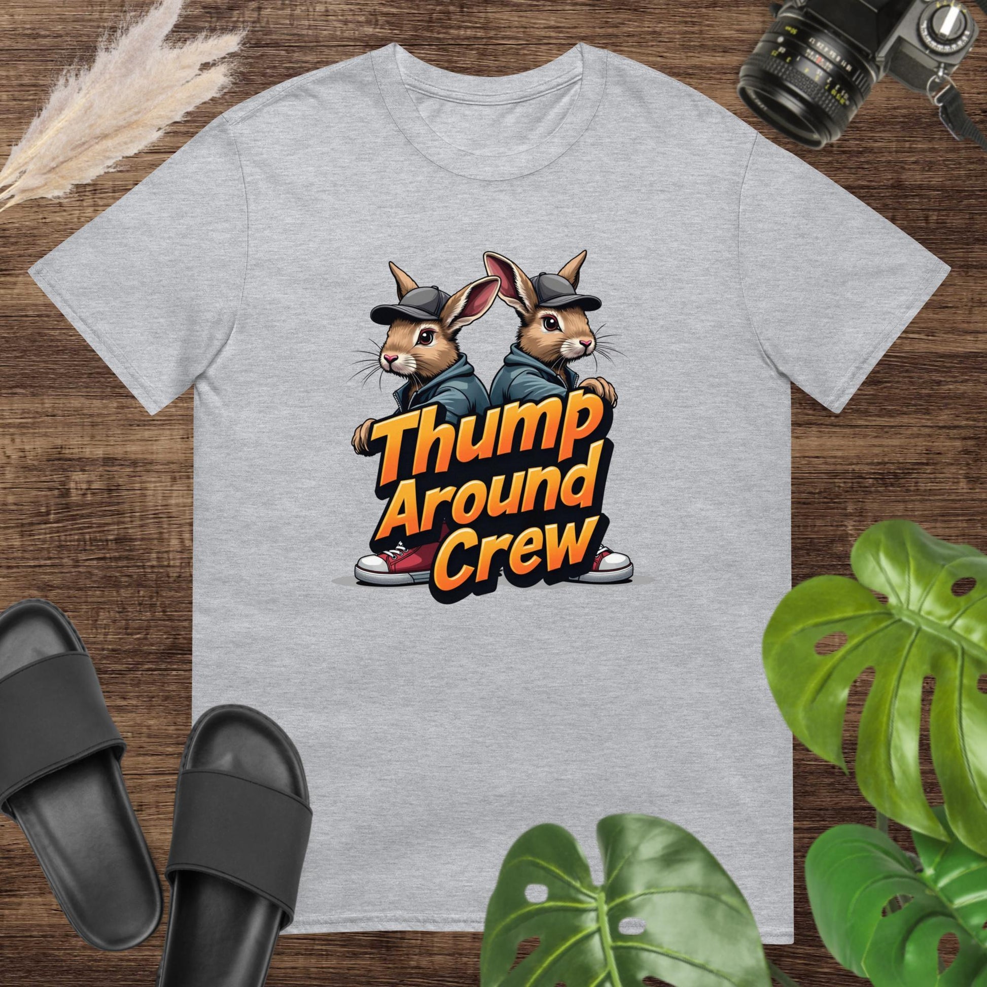 Streetware grey t-shirt featuring two dressed bunnies and the text thump around crew