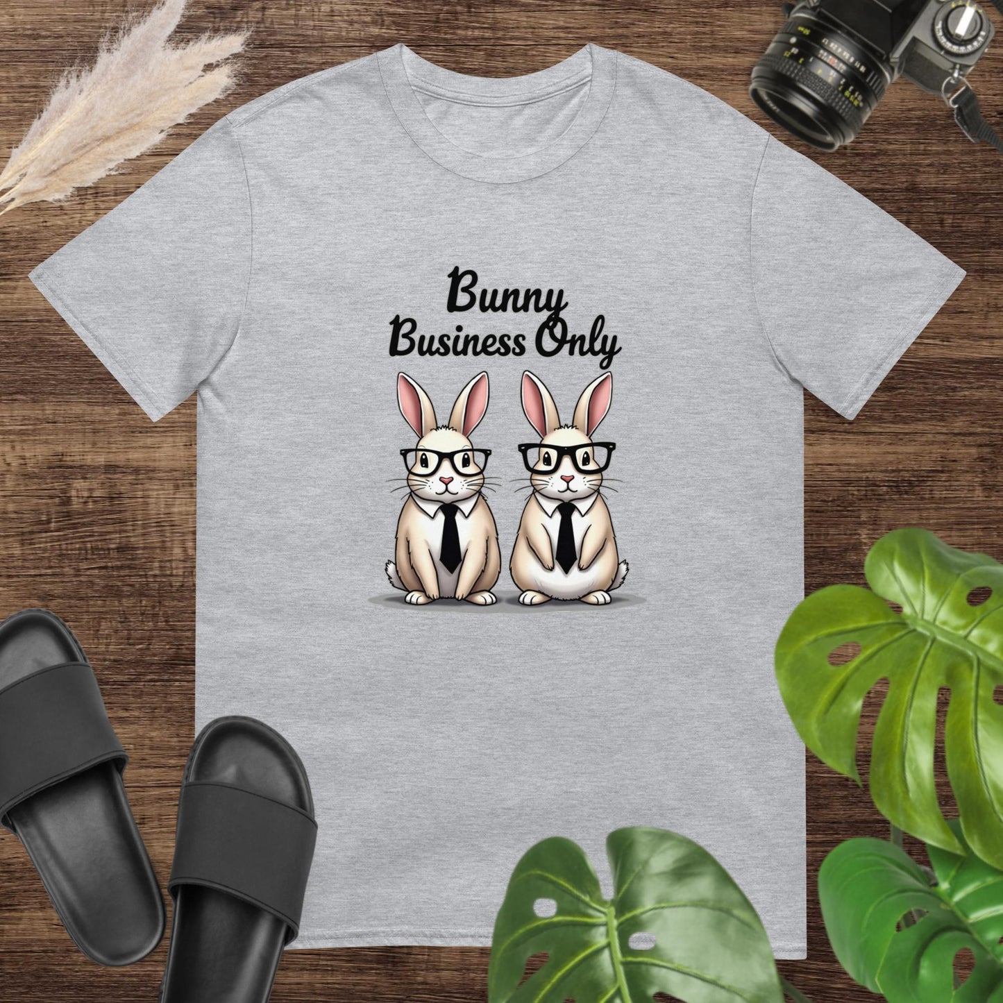Grey t-shirt featuring two bunnies with glasses with the text Bunny business only.