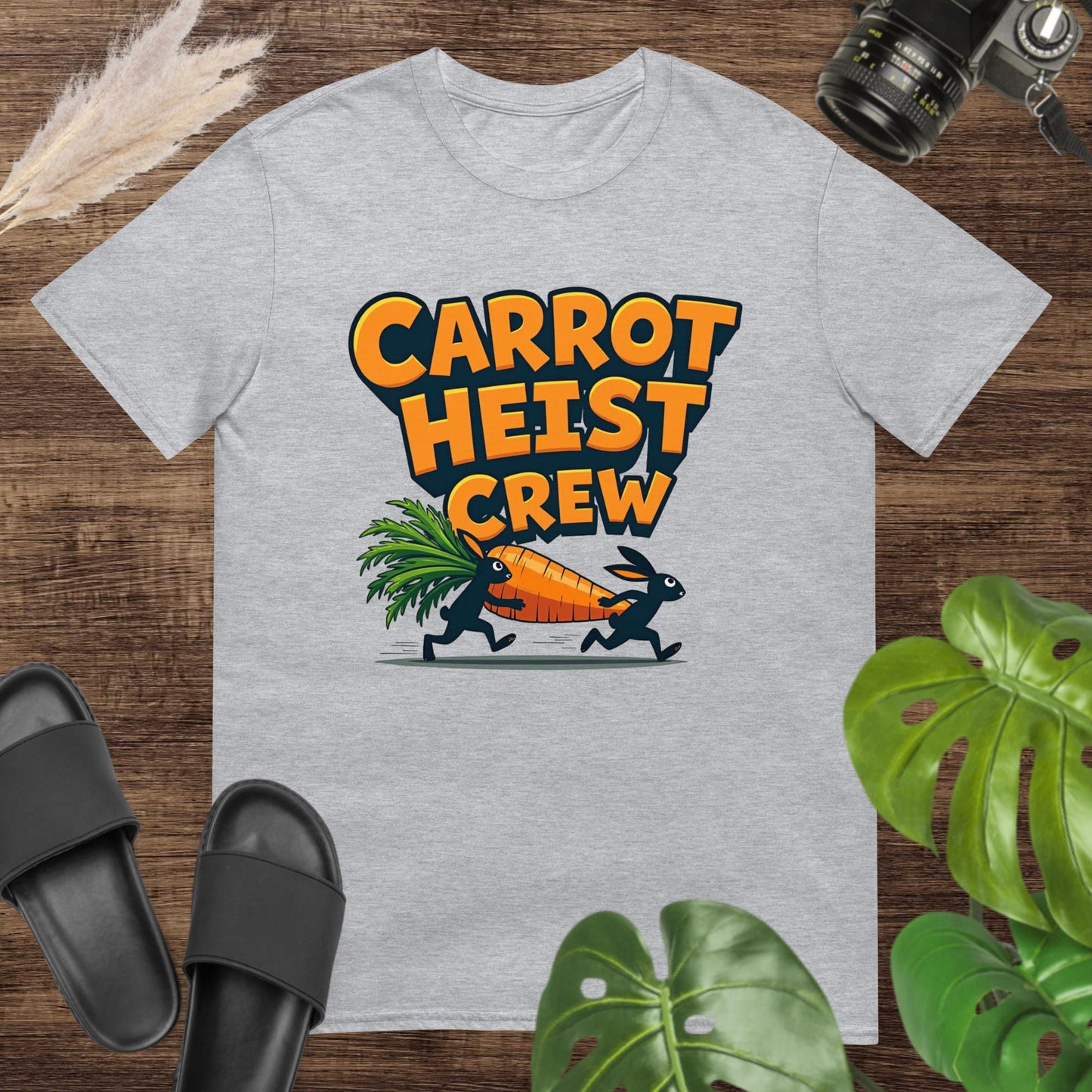 Funny carrot heist crew grey t-shirt design with two running rabbits holding a giant carrot
