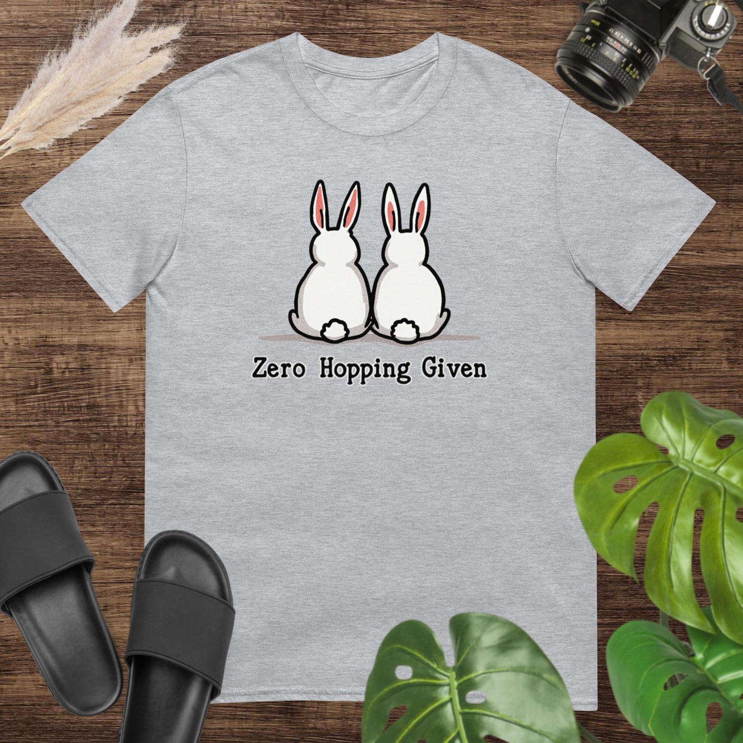 Cute and sassy zero hopping given grey t-shirt design with a rabbit duo turning their back