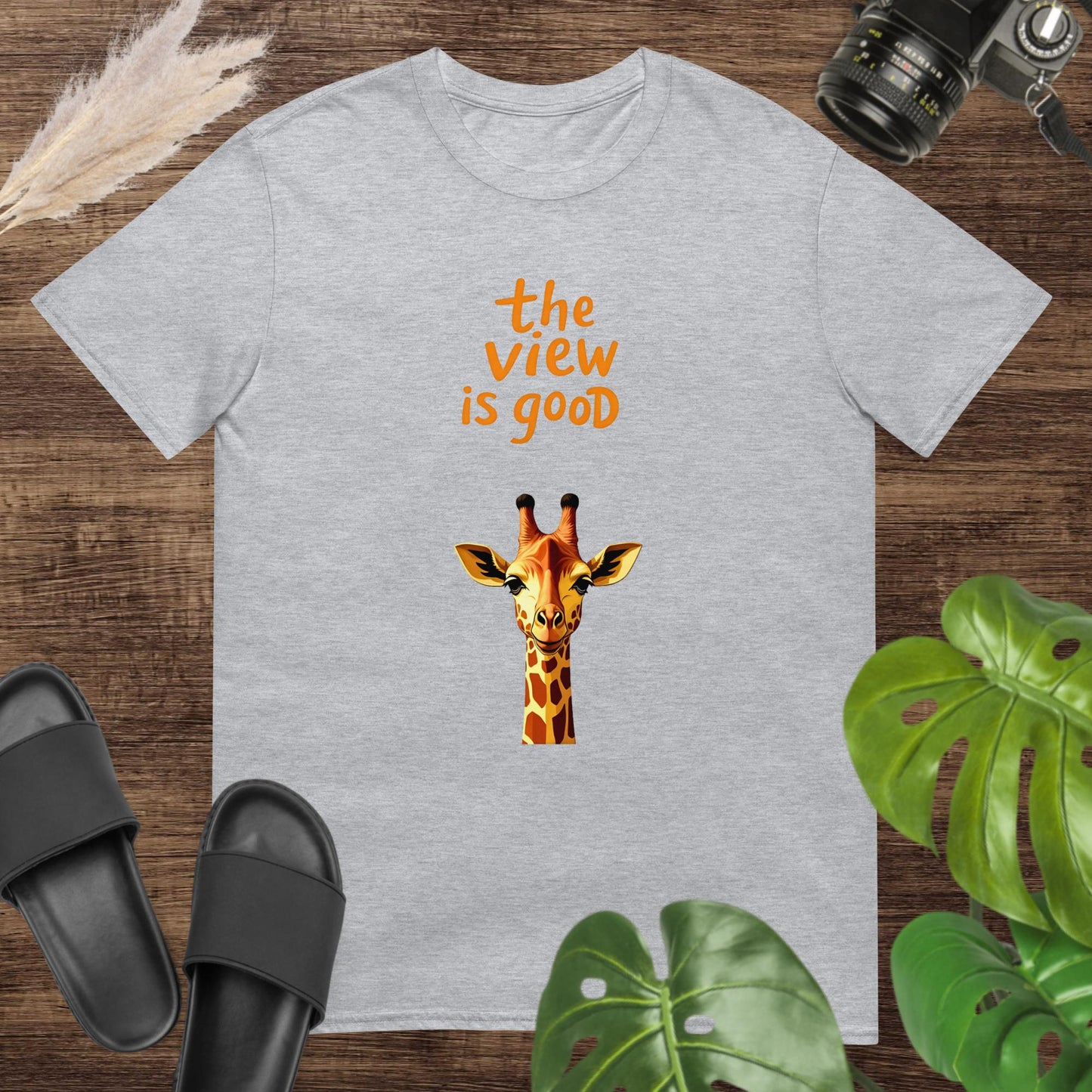 Funny giraffe head design grey t-shirt with the text "The View Is Good"