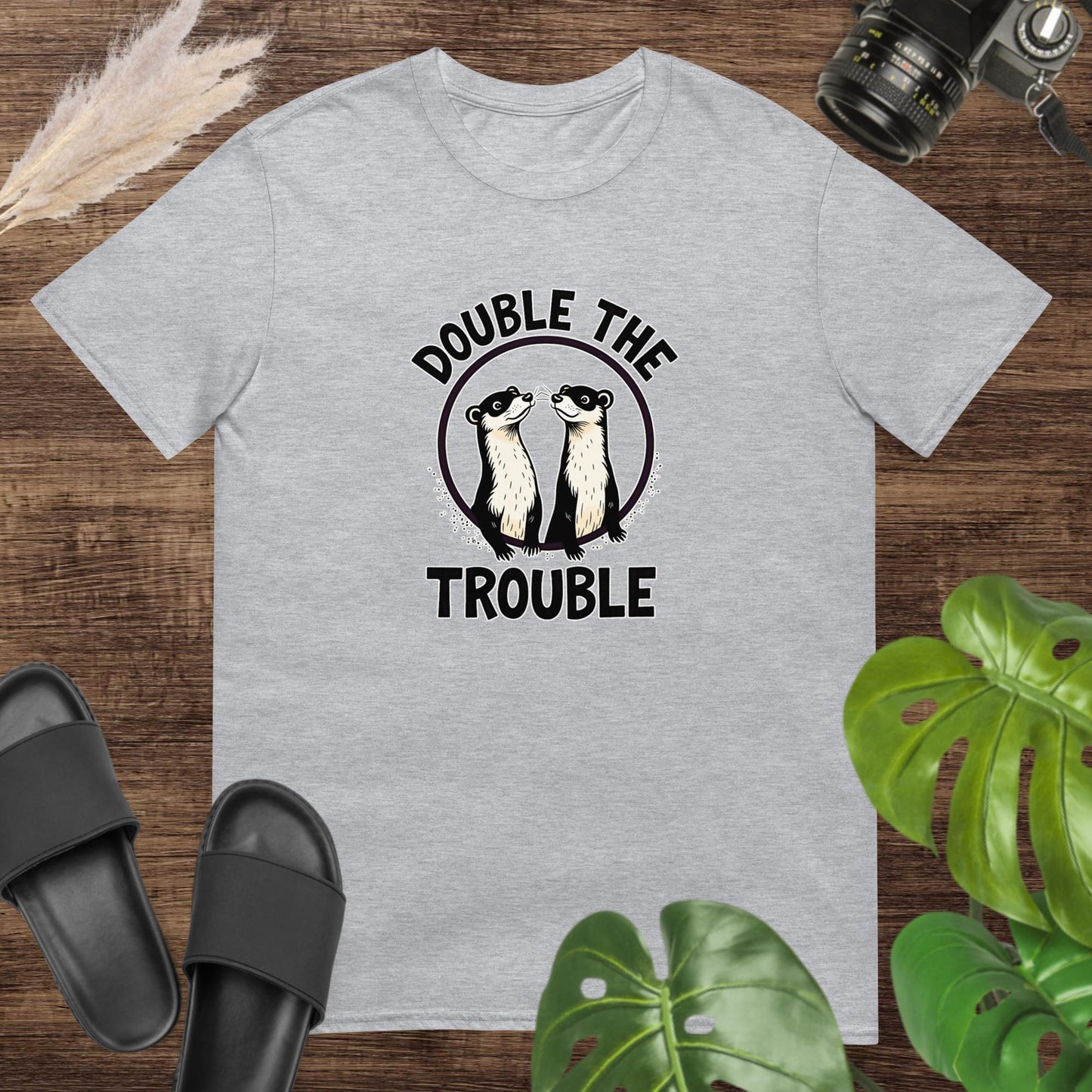 Unisex grey t-shirt featuring two ferret inside a circle with the text Double the Trouble.