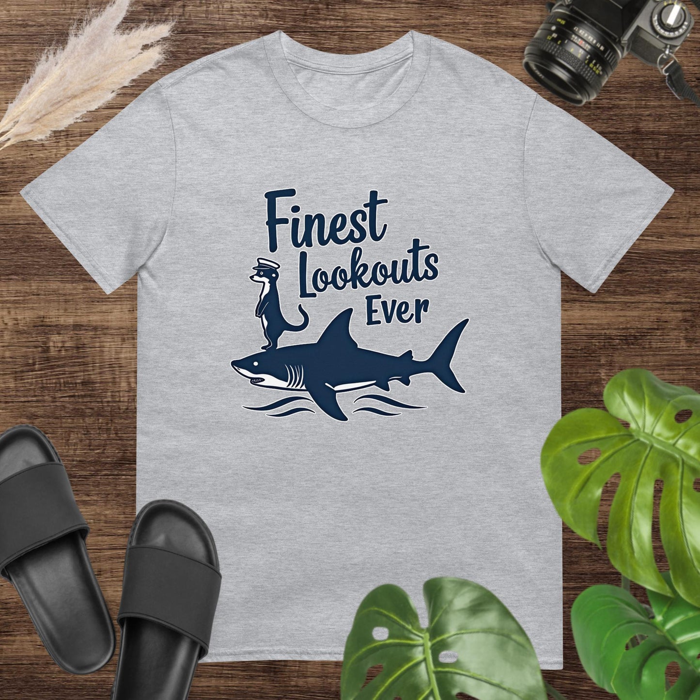 Unisex grey t-shirt featuring a shark with a meerkat and the text Finest Lookouts Ever.