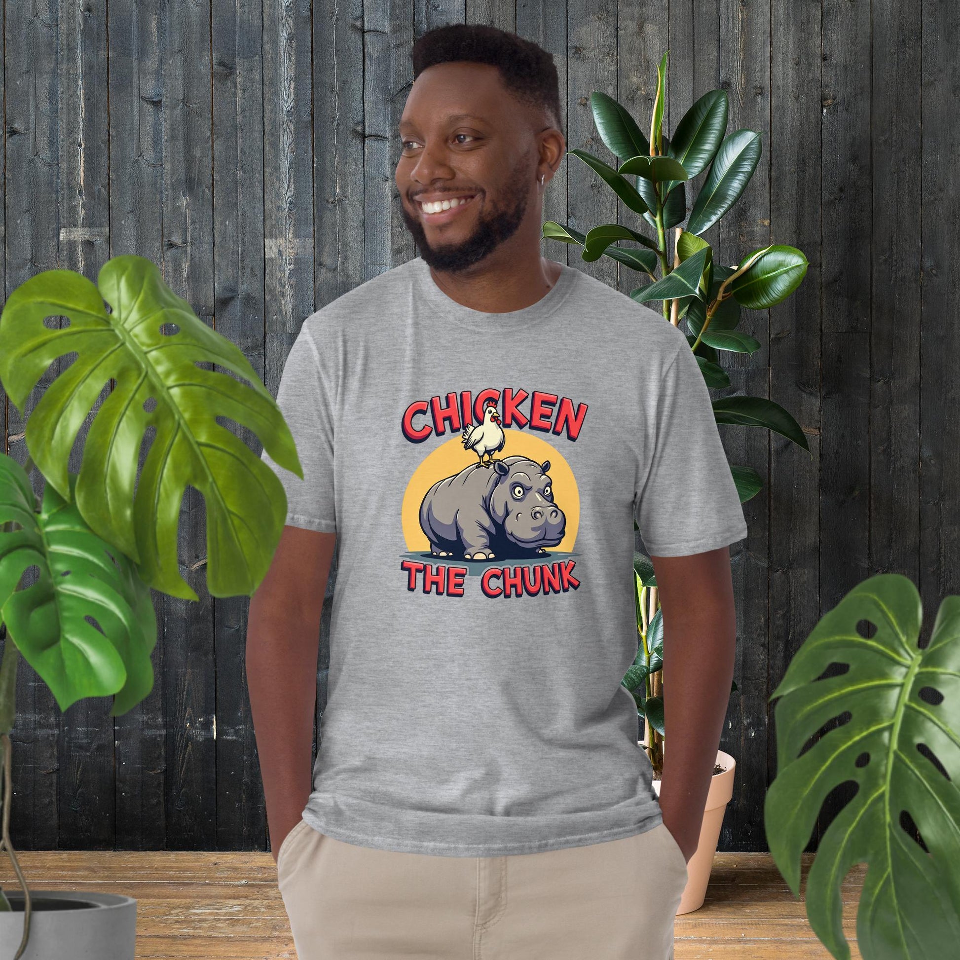 Man wearing funny unisex tee with chicken on hippo graphic, 100% ring-spun cotton, great gift for pet lovers
