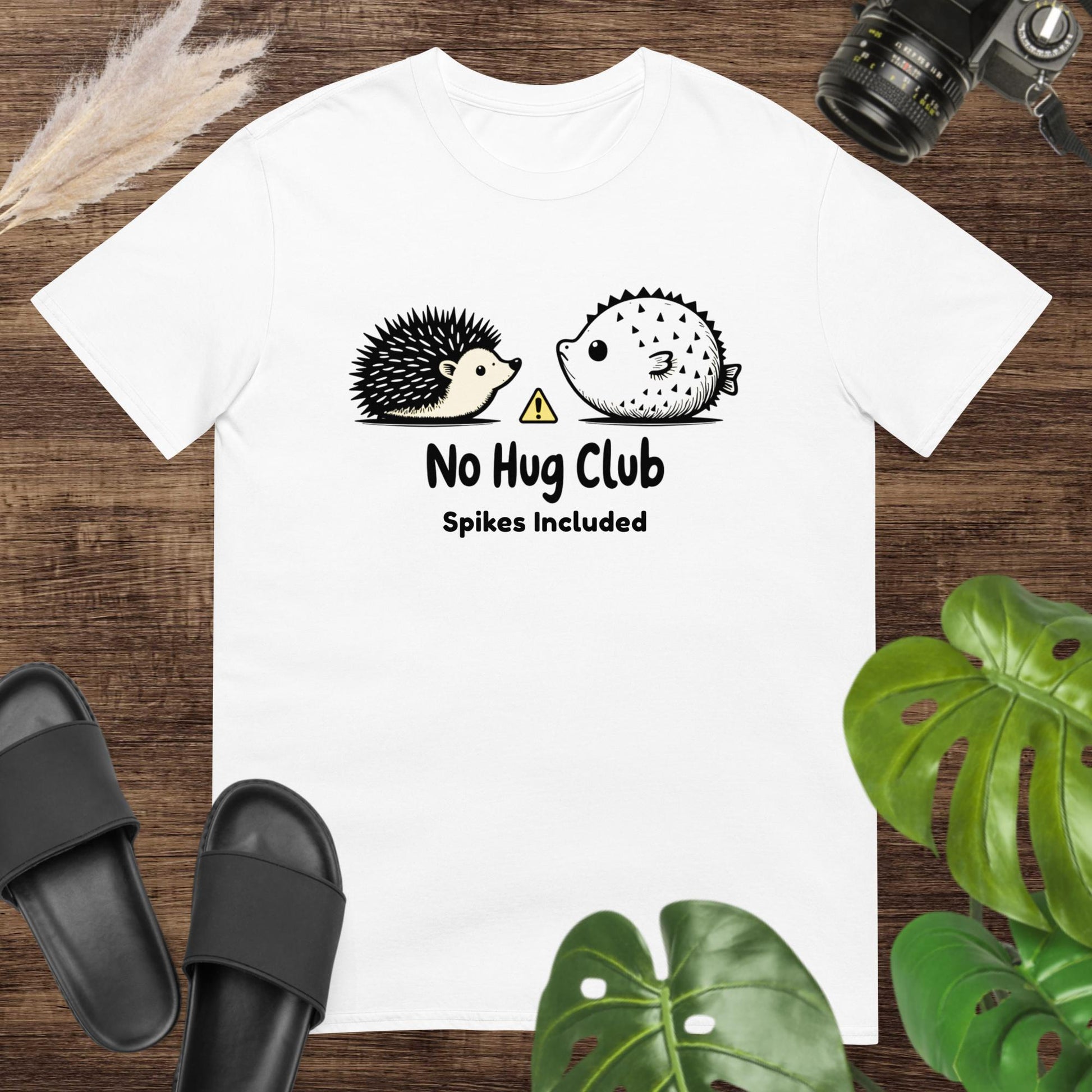 Unisex white t-shirt featuring a hedgehog and pufferfish shirt with a no-hug message.