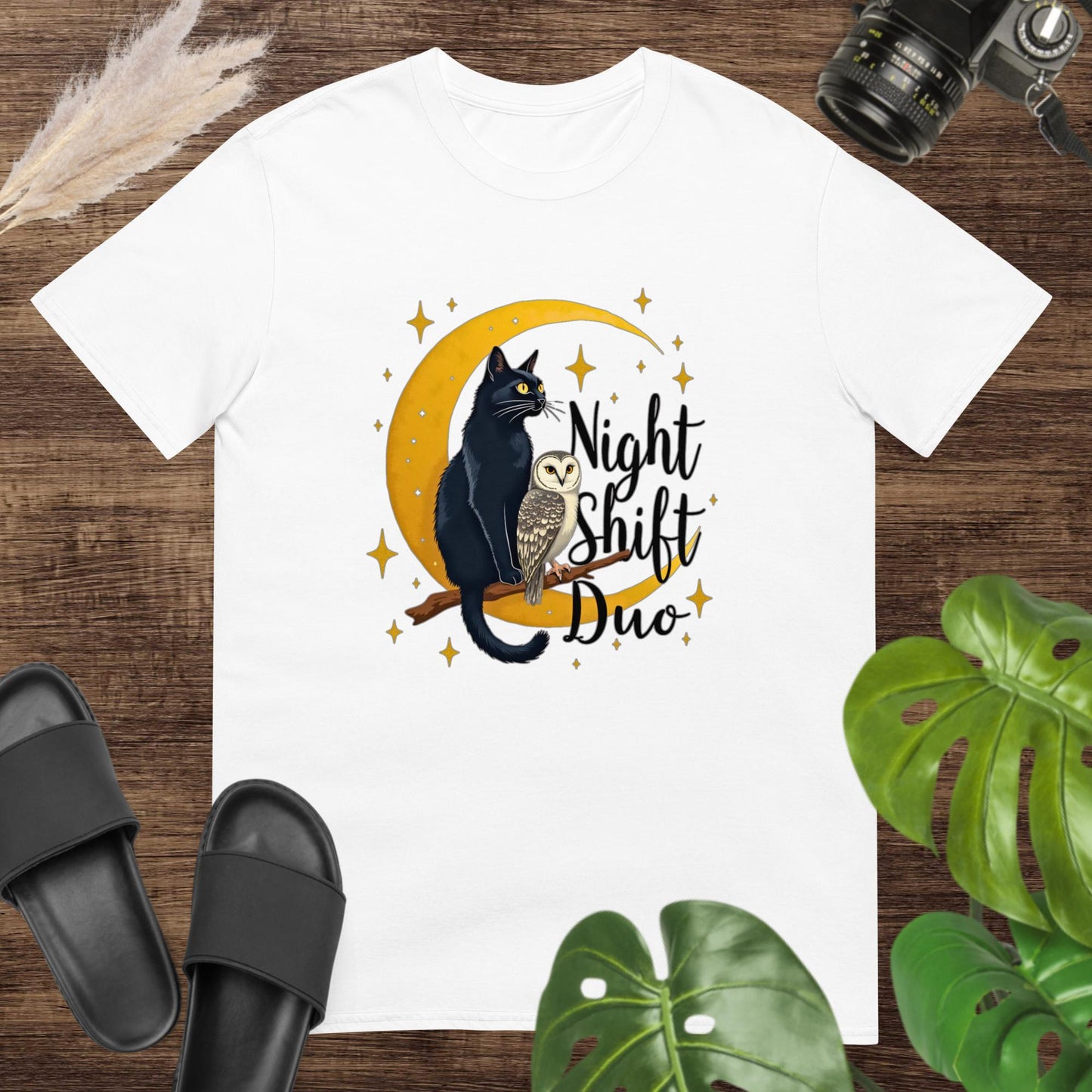 Cute white t-shirt featuring a cat and owl on a moon and branch with the text "Night Shitf Duo"