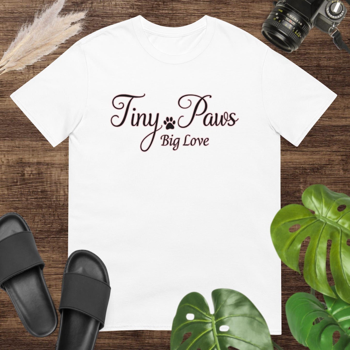 Cute white t-shirt featuring a tiny paw print with text Tiny Paws Big Love