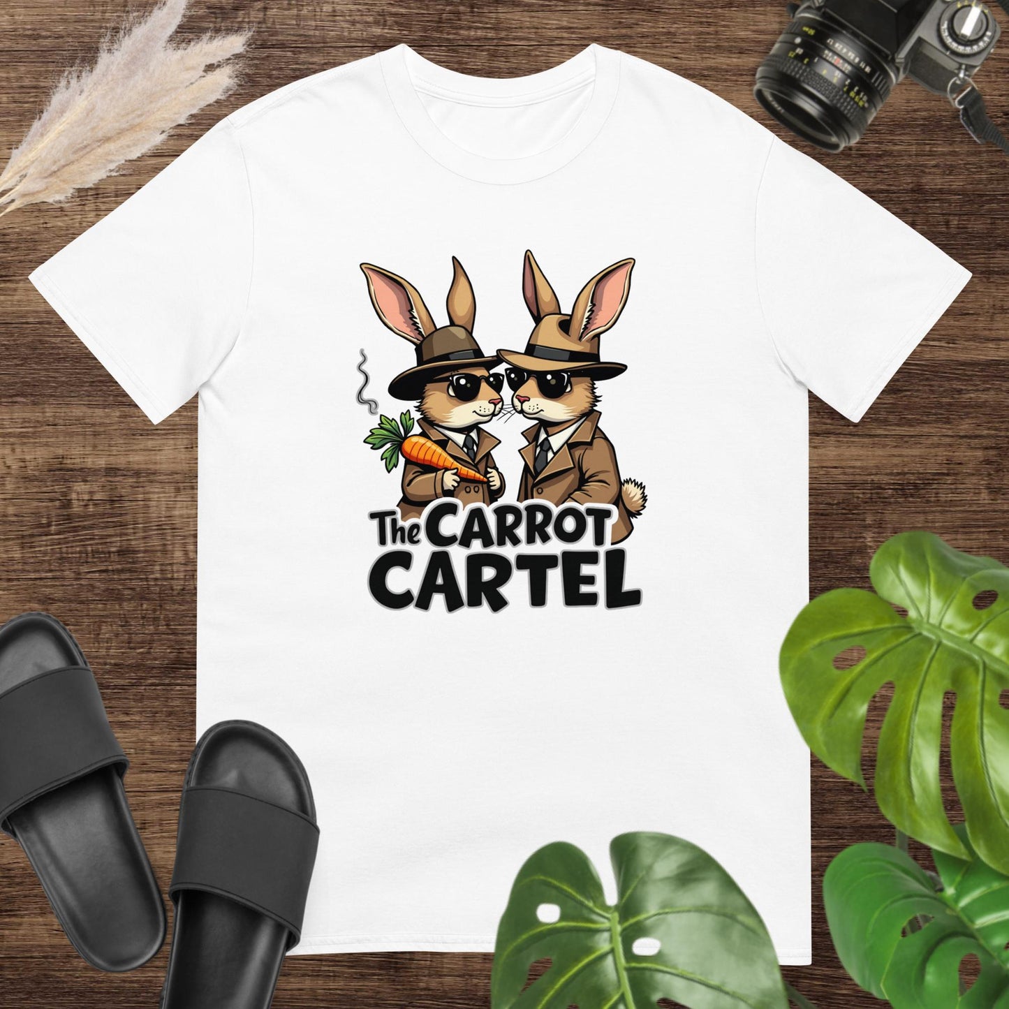 White t-shirt featuring two funny rabbit detectives with a steamed carrot and text The carrot cartel