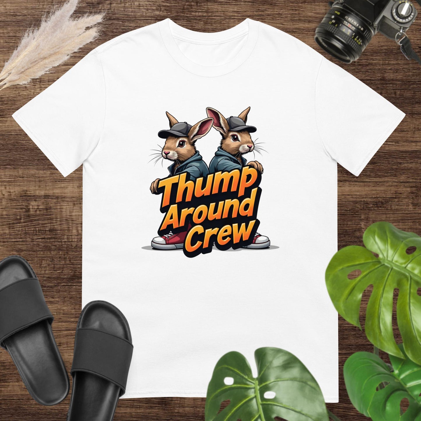 Streetware white t-shirt featuring two dressed bunnies and the text thump around crew