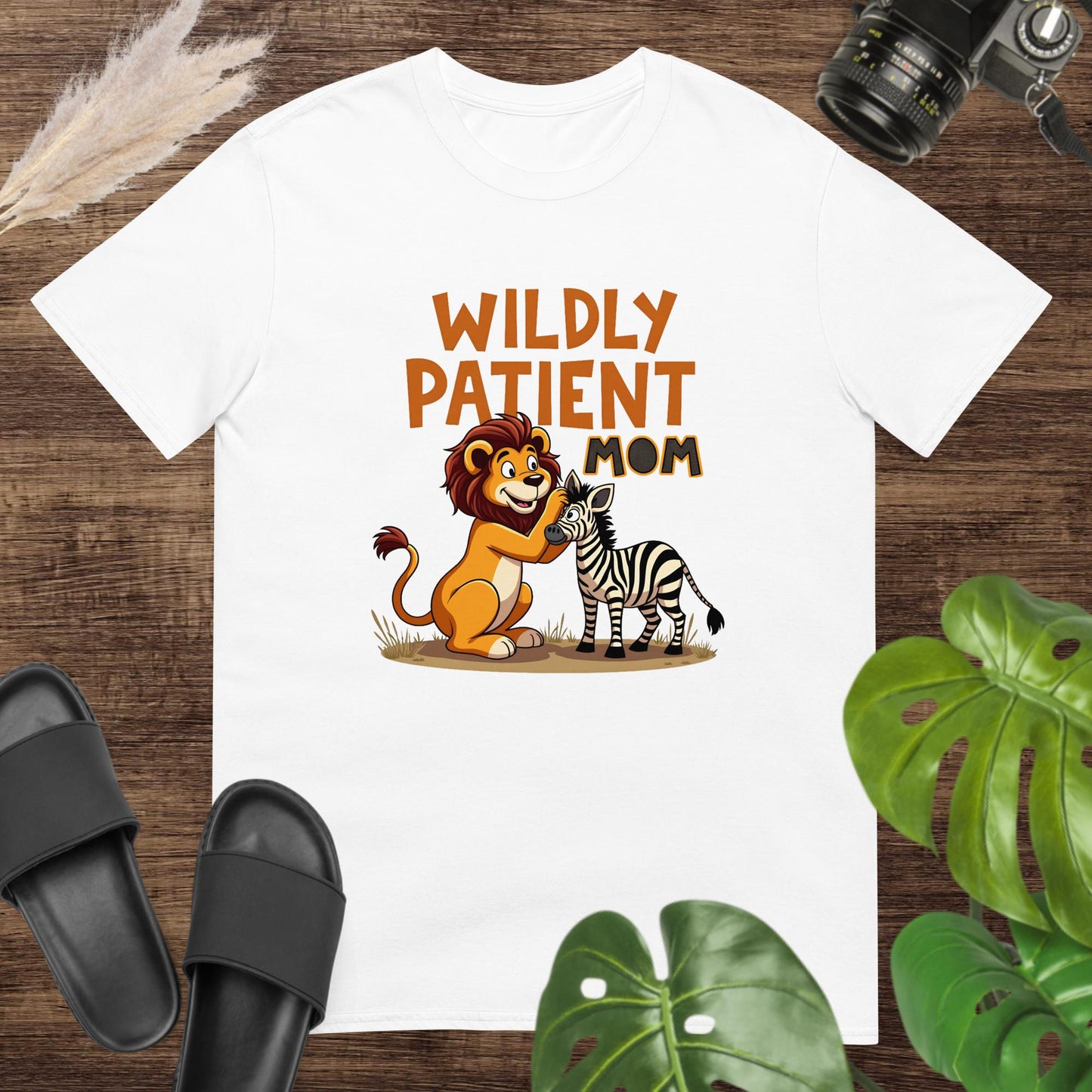 Cute unexpected duo "Wildly patient mom" white t-shirt design with a lion and a zebra