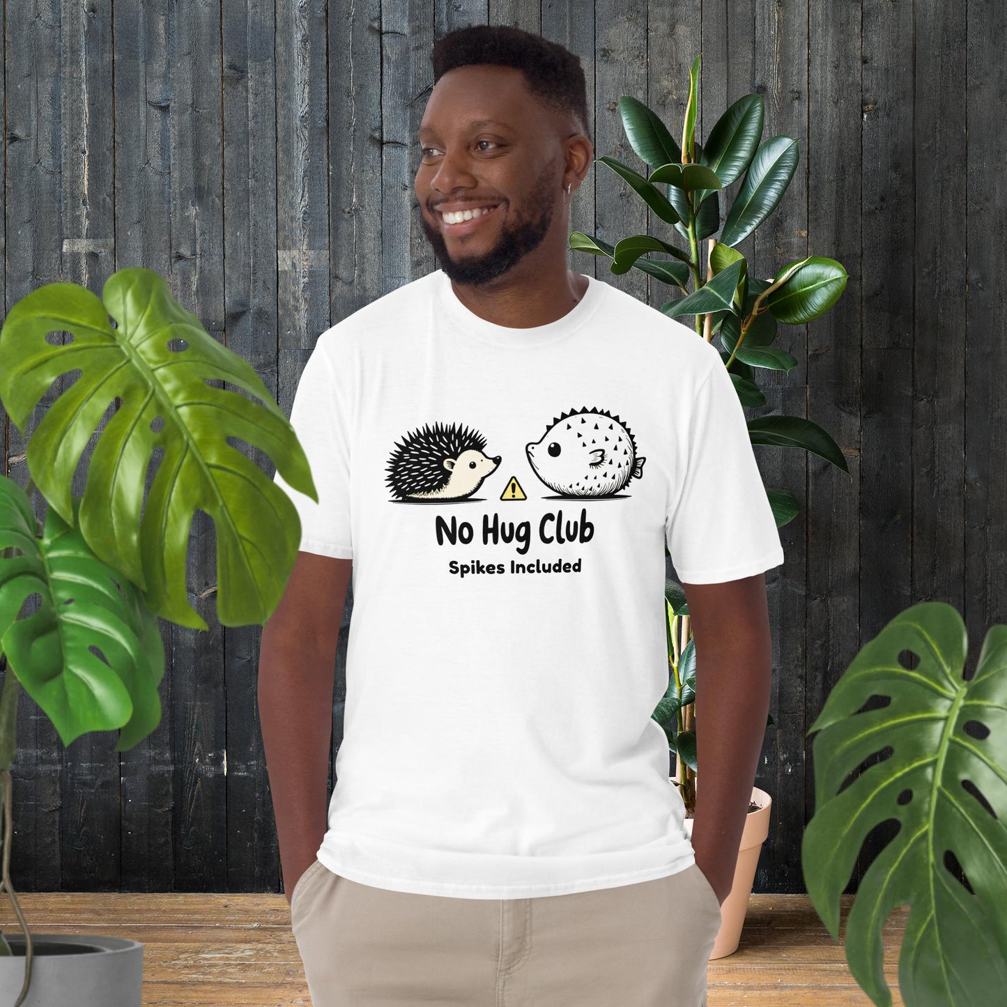 Man wearing funny unisex tee with hedgehog and pufferfish graphic, 'No Hug Club' text, perfect for pet lovers