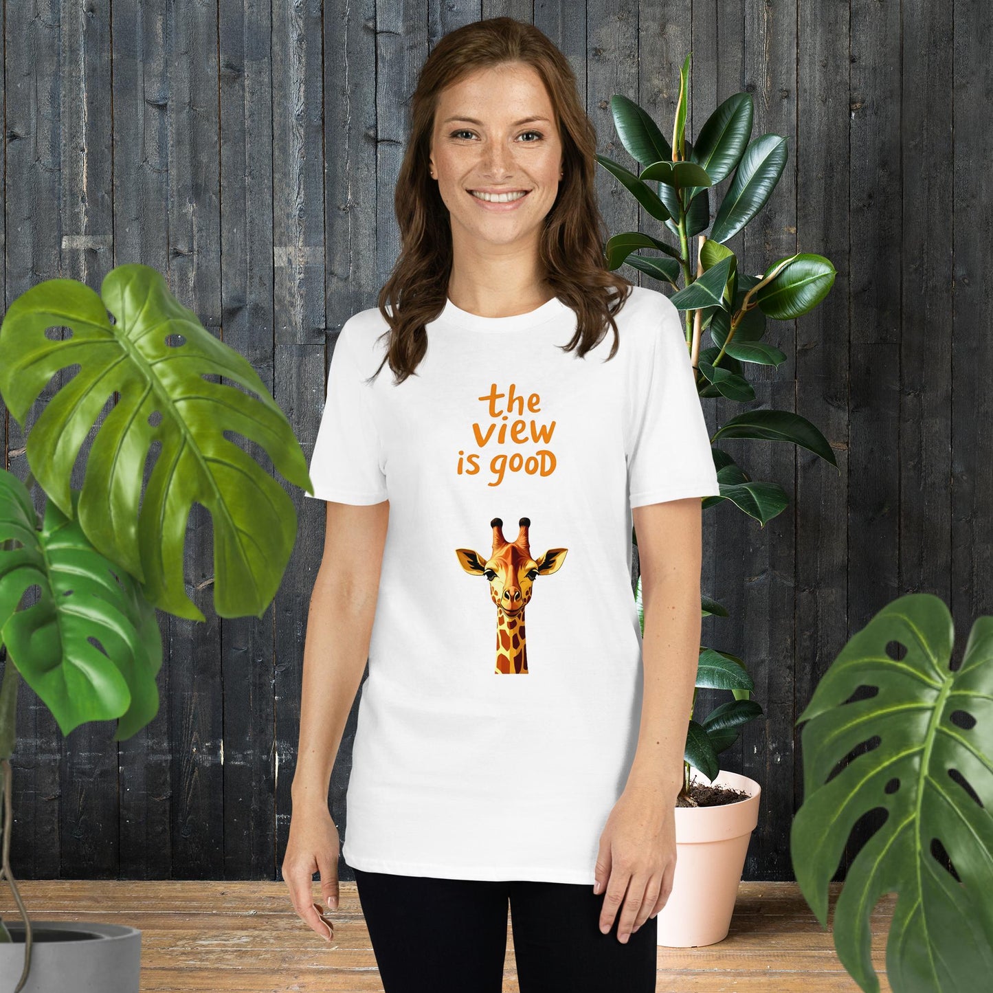 White unisex tee with giraffe graphic and 'the view is good' text, perfect gift for animal lovers