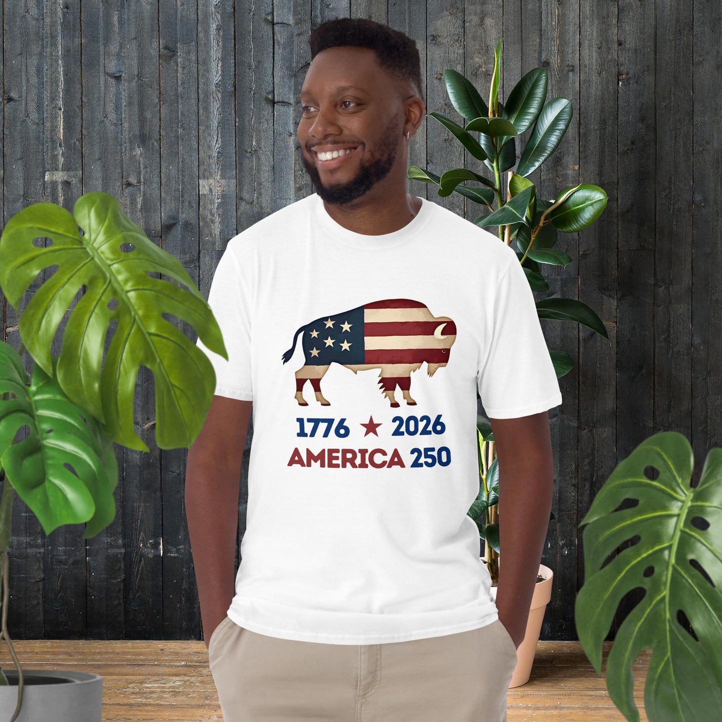 Man wearing white t-shirt with American flag bison graphic, '1776 2026 America 250' text, unisex patriotic tee