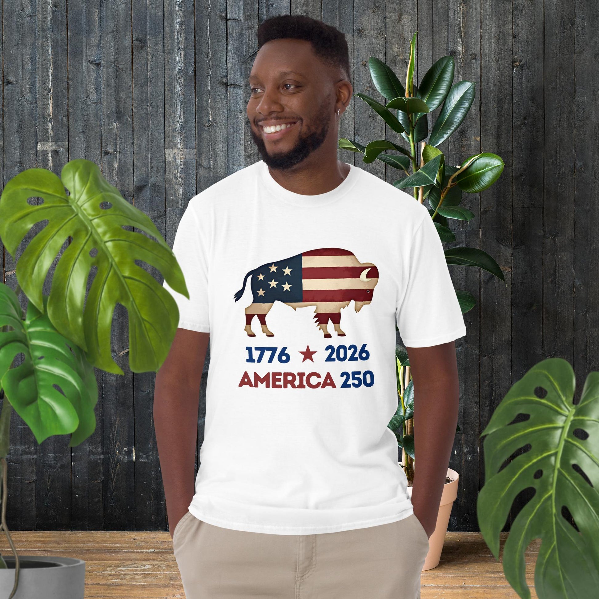 Man wearing white t-shirt with American flag bison graphic, '1776 2026 America 250' text, unisex patriotic tee