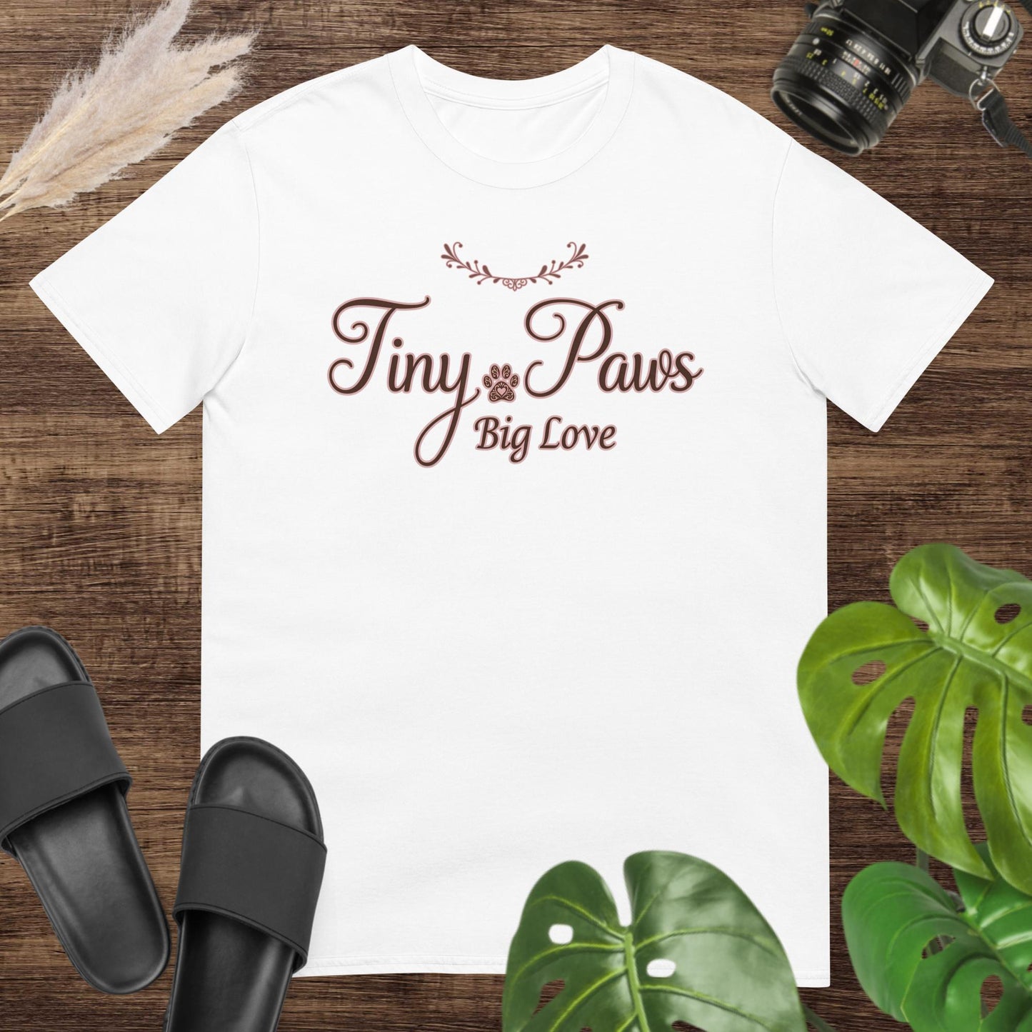 Cute white t-shirt featuring a tiny paw print with text Tiny Paws Big Love